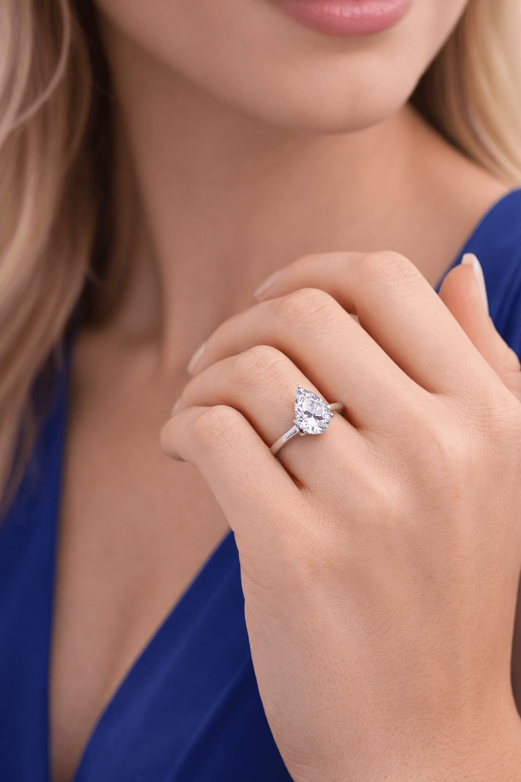 Pear shaped diamond ring setting styles